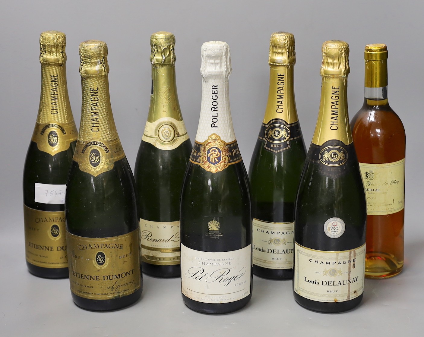 Two bottles of Etienne Dumont NV Champagne, two bottle of Louis Delauney NV Champagne, one bottle of Pol Roger NV Champagne, one bottle of Renard Barnier and a bottle of Chateau Jean Du Roy Cadillac , 1994. (7)